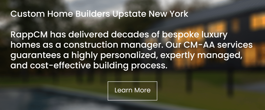 Text in front of blurred background. "Custom Home Builders Upstate New York RappCM has delivered decades of bespoke luxury homes as a construction manager. Our CM-AA services guarantees a highly personalized, expertly managed, and cost-effective building process. Learn More."